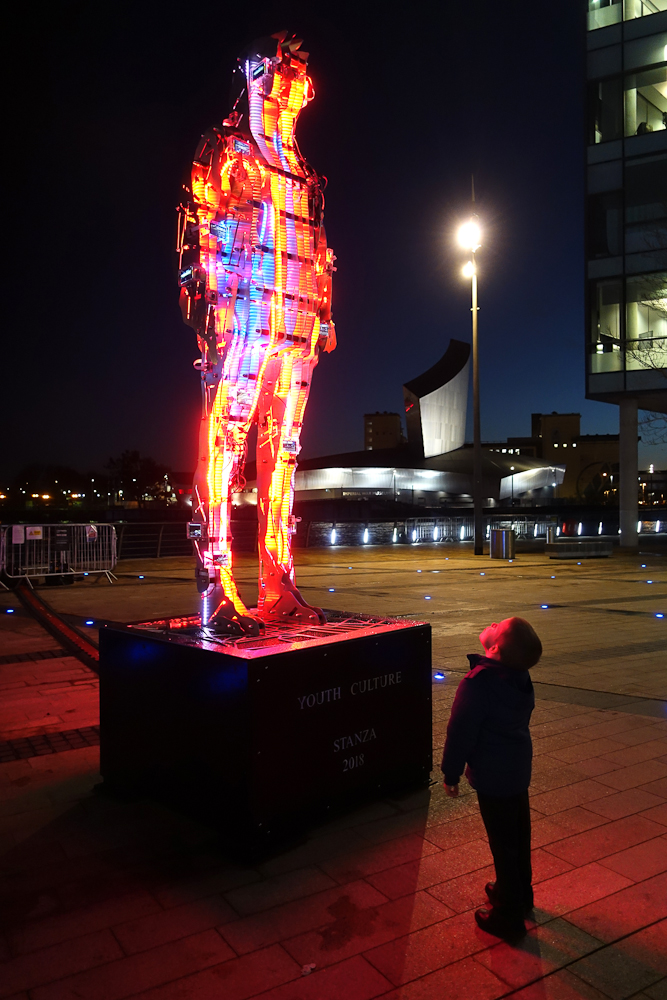 Youth Culture By Stanza. Large Light night sculpture with data and screens.